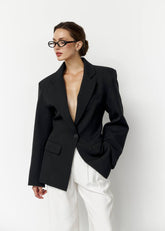 Jessy Jacket with one button adjusted at the waist